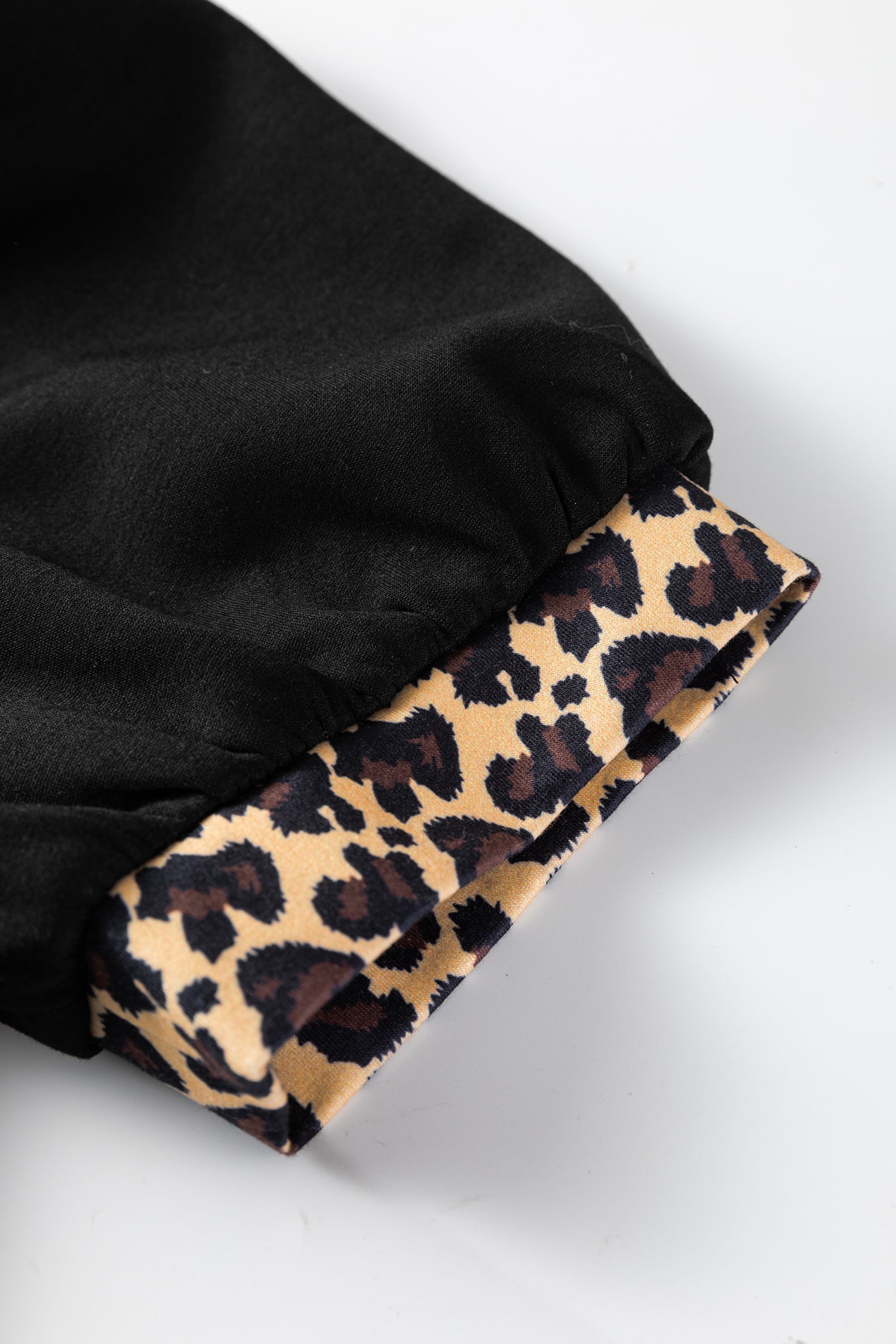Mini robe léopard patchwork col zippé manches courtes bouffantes droite noir