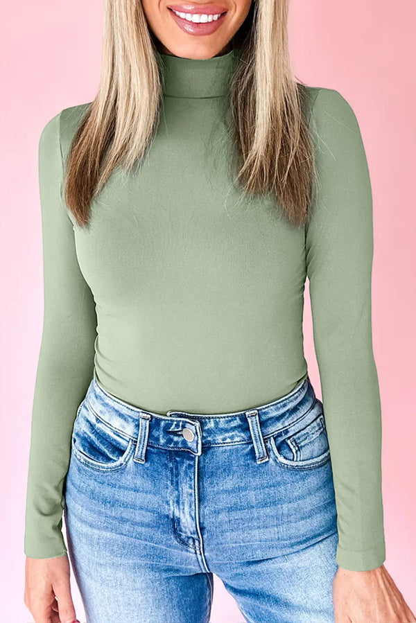 Haut femme manches longues, col montant, coupe slim — vert